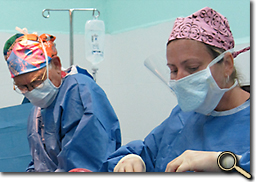 A team of surgeons and nurses operates on a patient in El Salvador photo