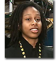Undergraduate student talking about physics lab research photo