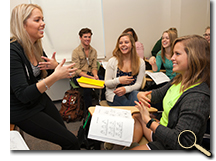 Graduate student Brooke Bonner teaching sign language class photo